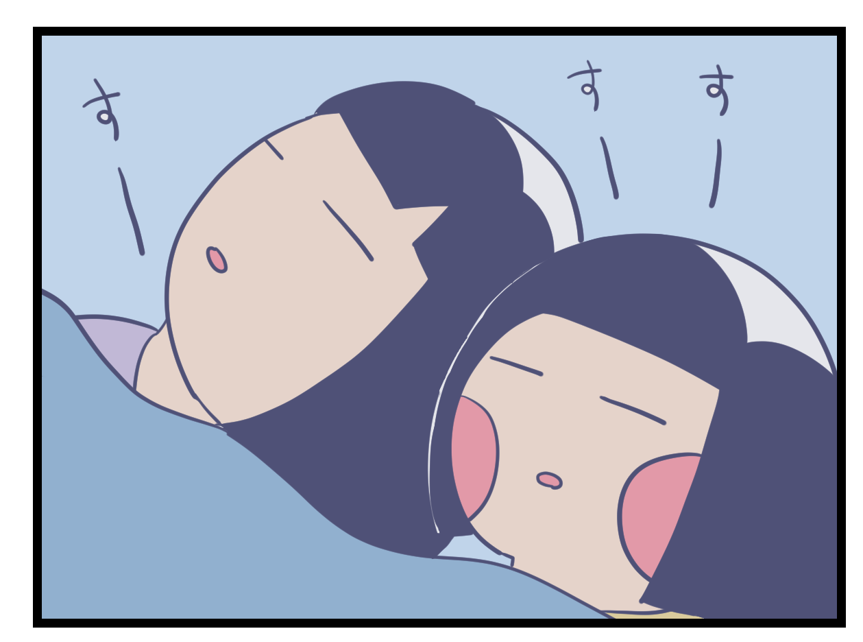 布団で寝息をたてて寝ている親子